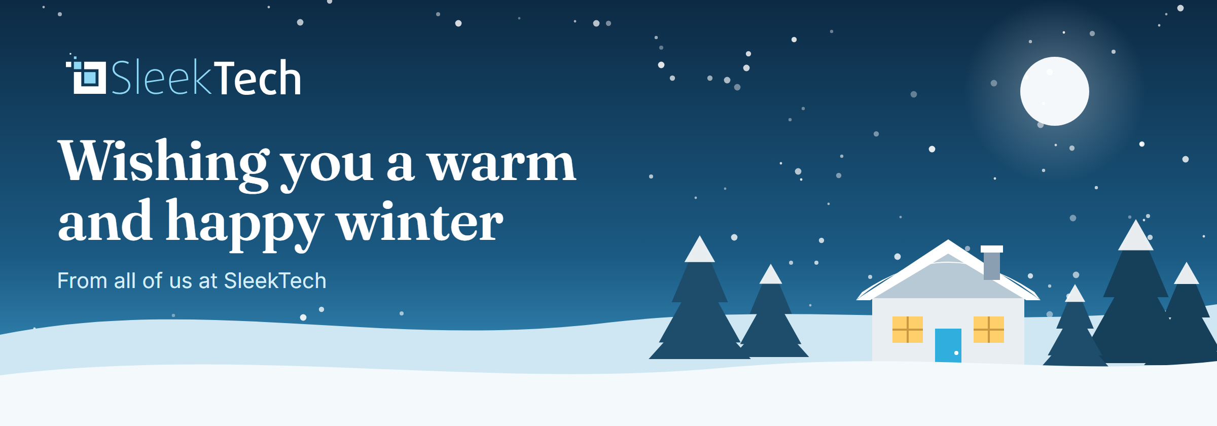 A snowy winter night with a house and pine trees: wishing you a warm and happy winter, from all of us at SleekTech.